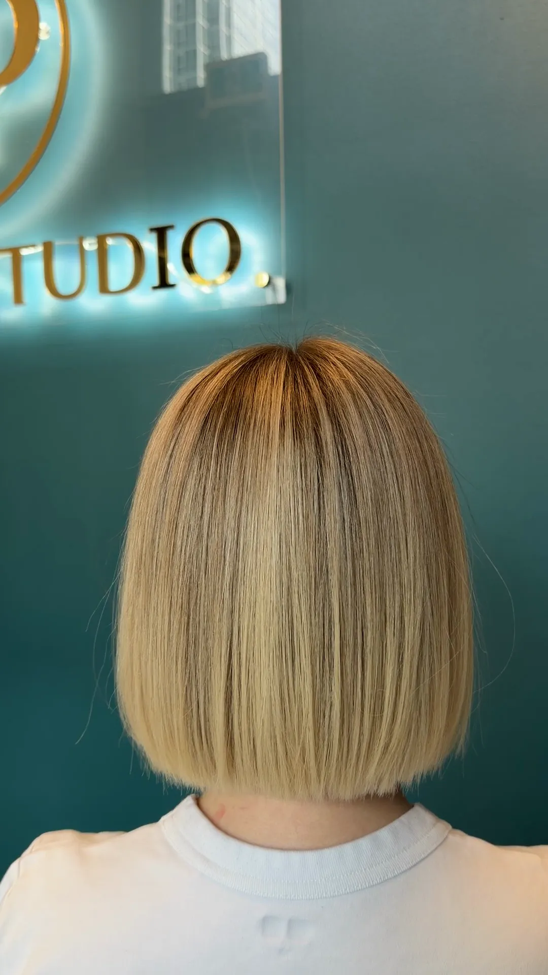 Blonde bob with a soft, darker root