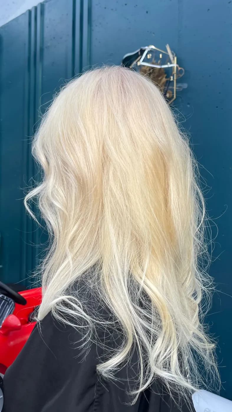 Bright blonde waves photographed in the studio
