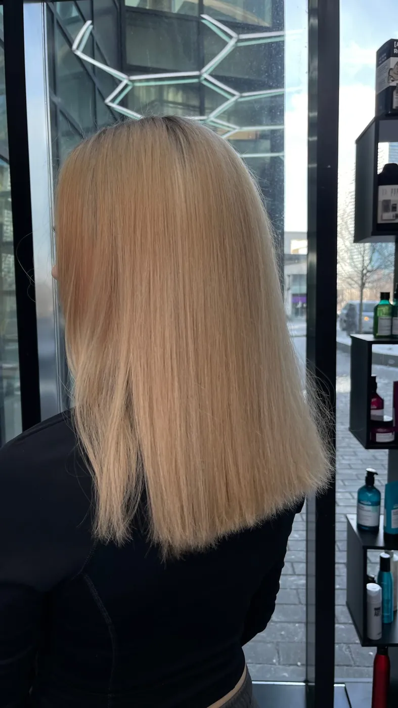 Sleek, glossy blonde lob after a colour appointment