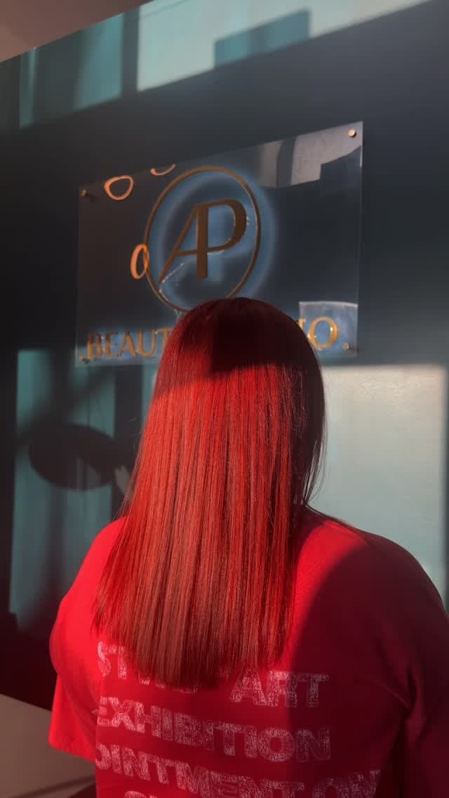 Vivid red, even colour in front of the AP Beauty Studio sign